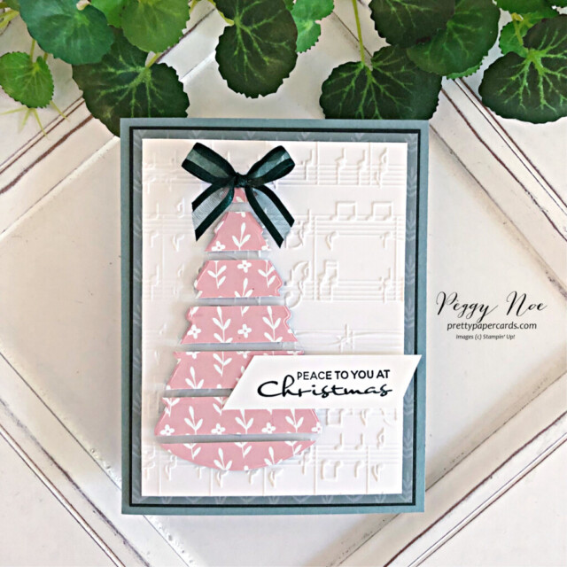 Handmade floating Christmas card created with the Peace to You stamp set by Stampin' Up! created by Peggy Noe of Pretty Paper Cards #peacetoyoustampset #floatingchristmastreecard #christmastreecard #stampinup #peggynoe #prettypapercards #stampingup #merrymelodyembossingfolder #fittingfloretsdsp
